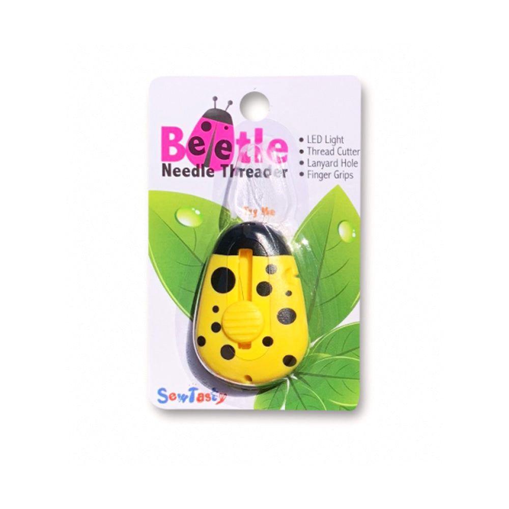 Enhebrador con luz mariposa